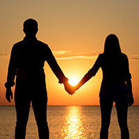 Two lovers (teenagers) are standing on the bridge (berth) and ho Two lovers (teenagers) are standing on the bridge (berth) and ho